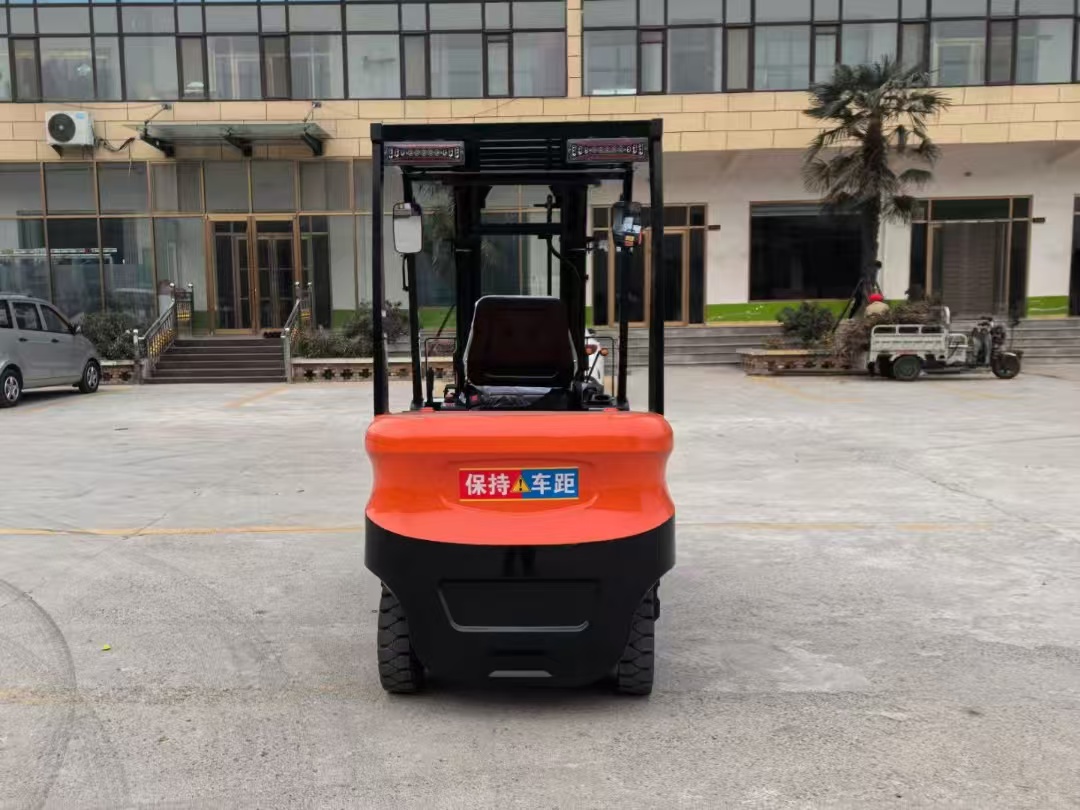 BaGong 2-ton electric forklift orange warehouse operation